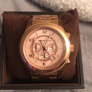 Michael Kors watch (pillow not included)